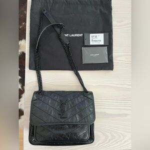 Saint Laurent Niki Baby in black vintage leather excellent condition